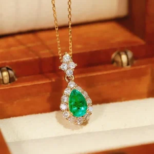 Romantic Yellow Gold Emerald Pendant Necklace