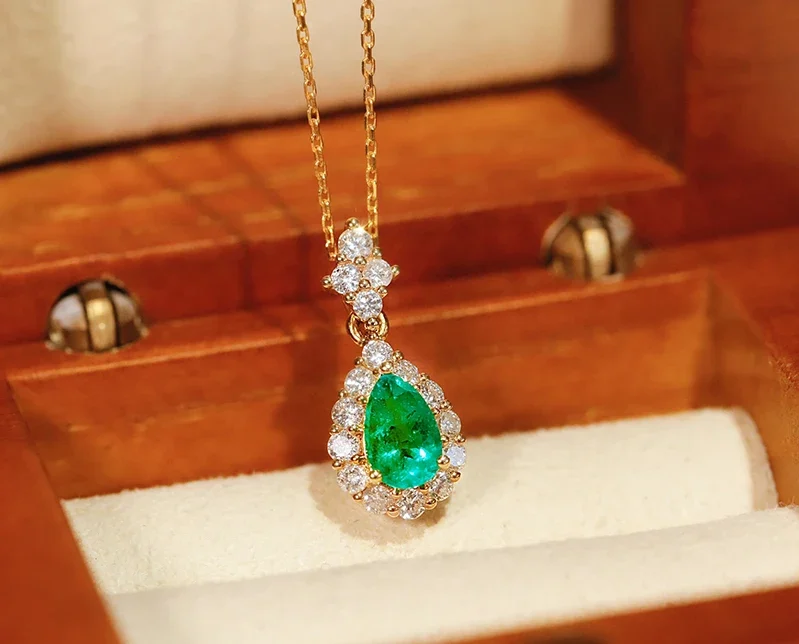 Romantic Yellow Gold Emerald Pendant Necklace