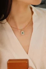 Luxury Yellow Gold Emerald and Diamond Necklace - Image 4