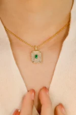 Luxury Yellow Gold Emerald and Diamond Necklace - Image 3