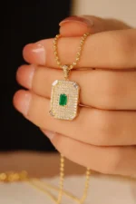 Luxury Yellow Gold Emerald and Diamond Necklace - Image 2