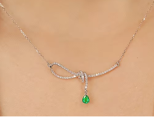 Elegant White Gold Emerald Pendant Necklace