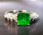 Elegant White Gold Emerald and Diamond Ring