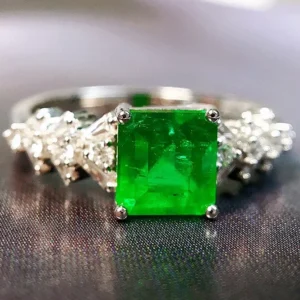 Elegant White Gold Emerald and Diamond Ring