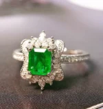 White Gold Emerald and Diamond Engagement Ring