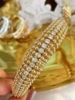 Elegant Yellow 18K Gold Diamond Bangle